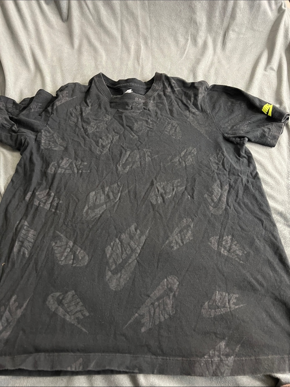 Nike Black All-Over Logo Short Sleeve Tee with Yellow Sleeve Tab